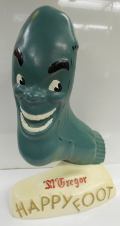 Latex counter model of the maniacal smiling sock - typically found in chain stores that carried Happy Foot McGregor socks in the 1950s